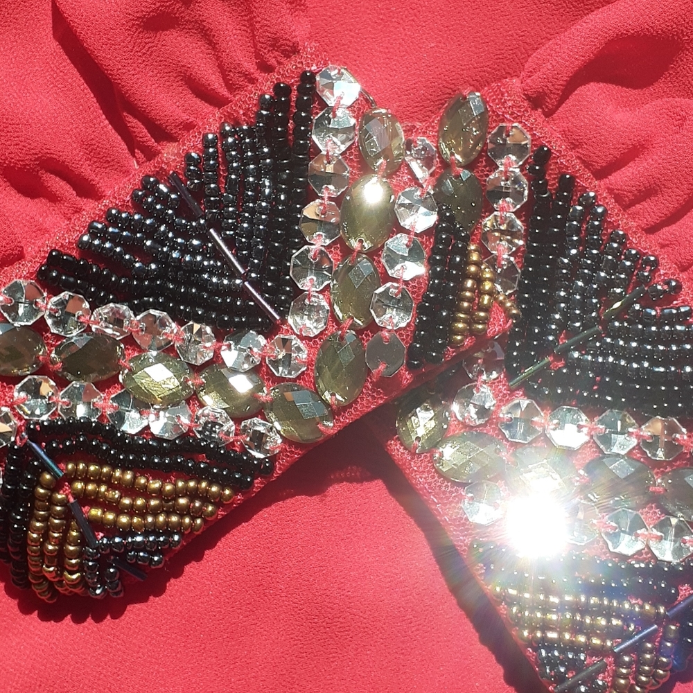 Mesmerizing red Dina Be dress with beaded cuffs